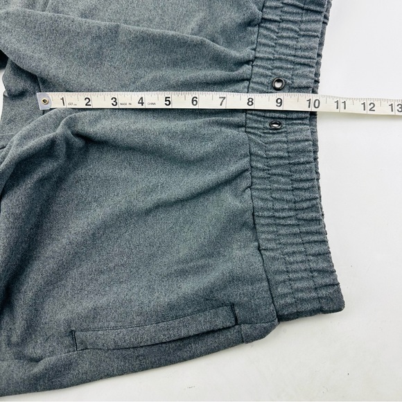 Alphalete Zipper Ankle Reflective Jogger Embroidered Back Waistband Heather Grey - Picture 9 of 13